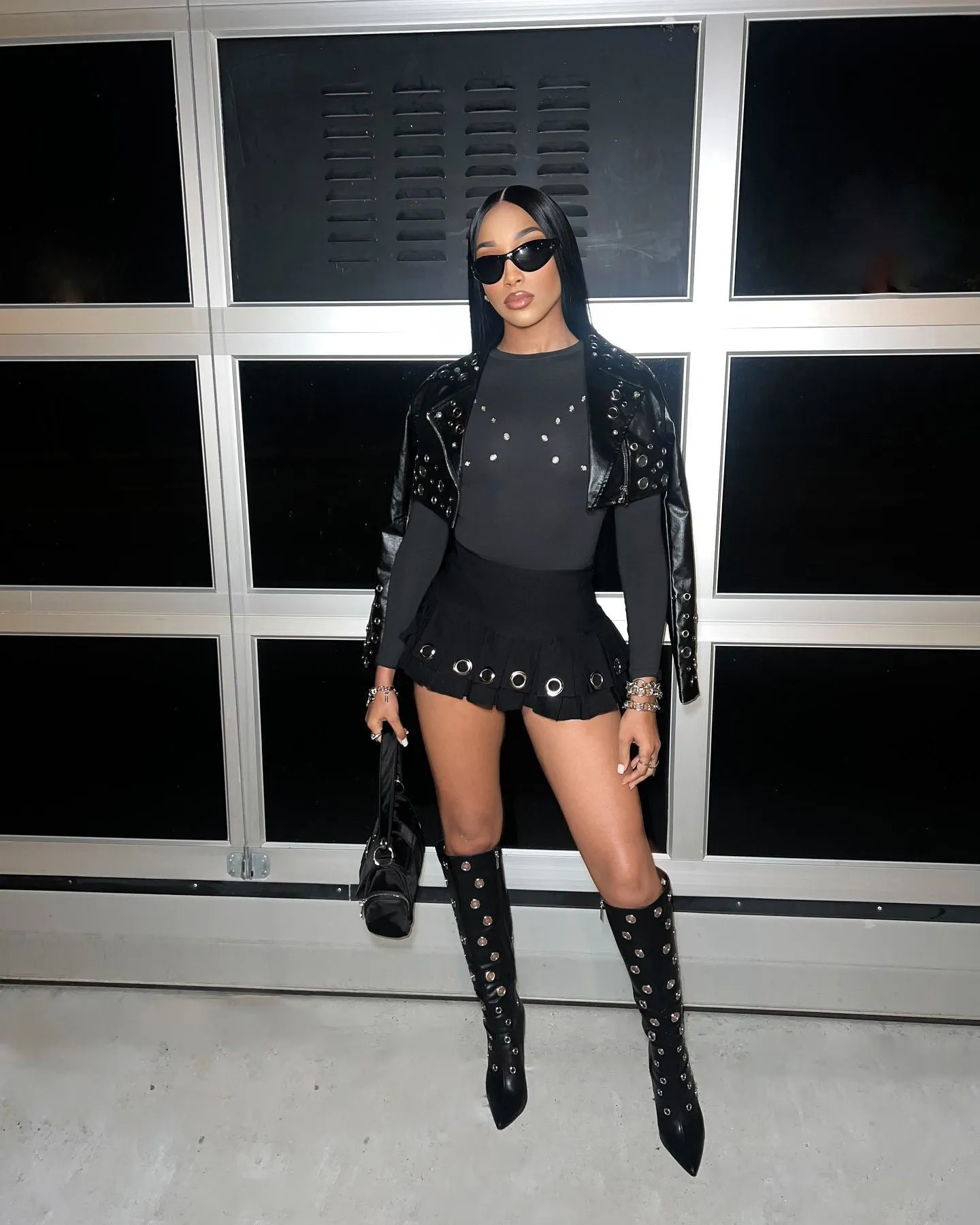 Edgy High-Waisted Pleated Mini Skirt with Bold Punk Aesthetic