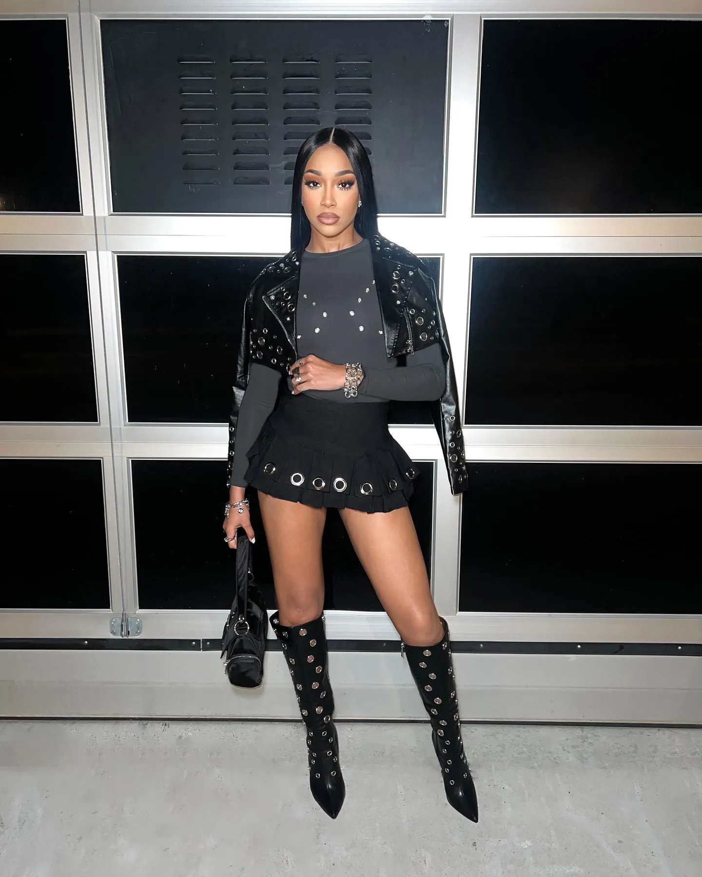 Edgy High-Waisted Pleated Mini Skirt with Bold Punk Aesthetic